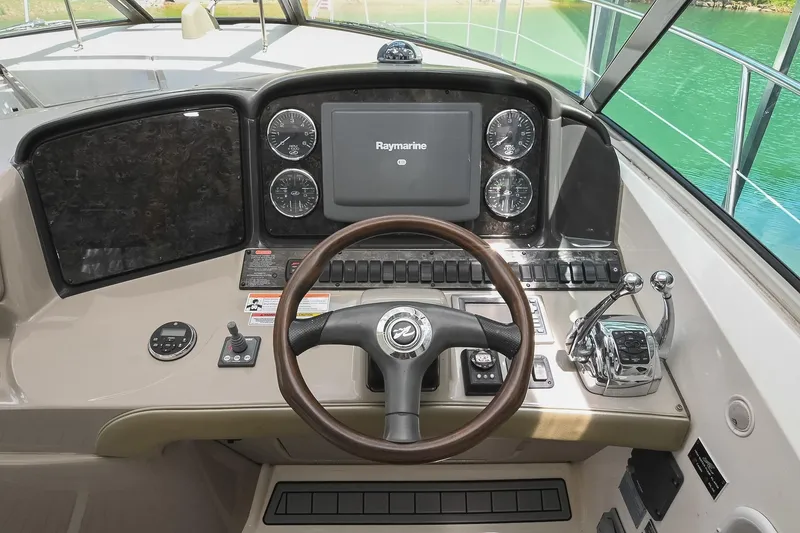 Slide: The Image of Helm of 2008 Sea Ray 38 Sundancer with Raymarine display and controls. - 21