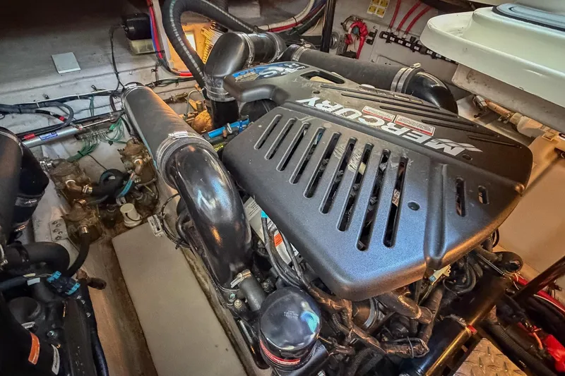 Slide: The Image of Engine compartment of a 2008 Sea Ray 38 Sundancer with MerCruiser engine. - 61