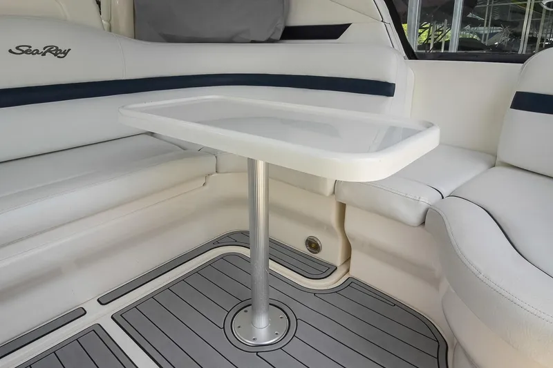 Slide: The Image of Luxurious seating area on a 2008 Sea Ray 38 Sundancer yacht with sleek table design. - 11