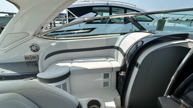 Slide: The Image of The image shows the cockpit of a 2017 Formula 37 Performance Cruiser with sleek white upholstery. - 26