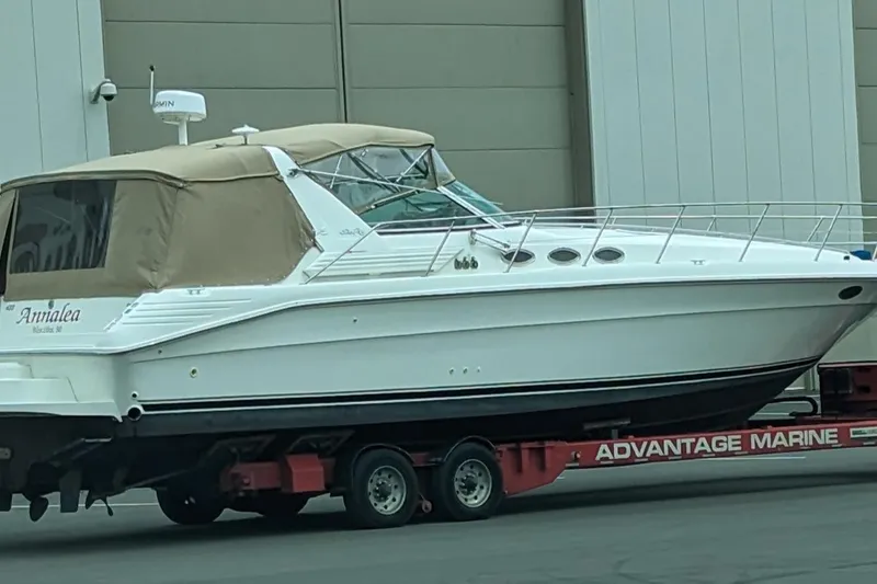 Slide: The Image of 1994 Sea Ray 400 Express Cruiser on trailer at Advantage Marine facility. - 34
