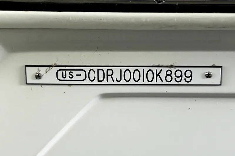 Slide: The Image of 1999 Carver 326 Aft Cabin Motor Yacht hull identification number plate. - 27
