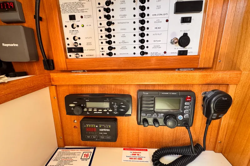 Slide: The Image of Control panel of a 2006 Catalina 34 MkII sailboat with navigation and communication equipment. - 9