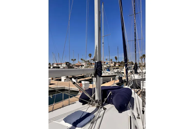 Slide: The Image of 2006 Catalina 34 MkII sailboat docked at marina under clear blue sky. - 20