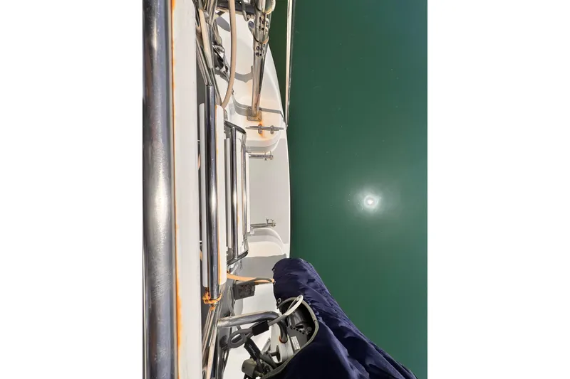 Slide: The Image of Catalina 34 MkII sailboat deck view, 2006 model, reflecting on calm water. - 19