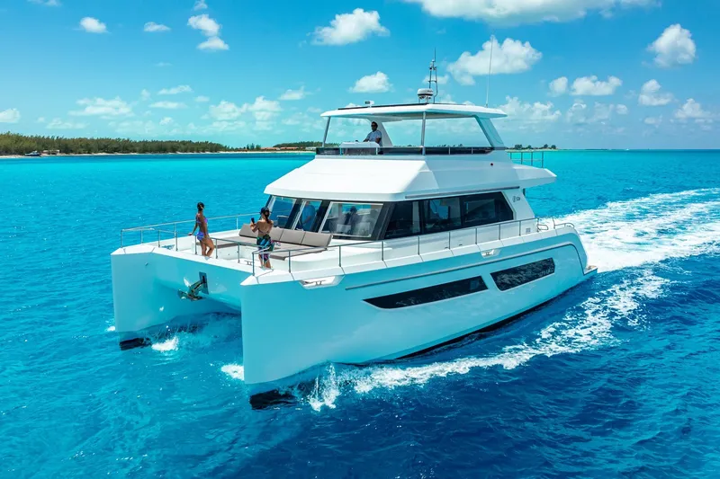 Slide: The Image of Luxurious ILIAD 53F yacht cruising in clear blue waters, 2027 model. - 0