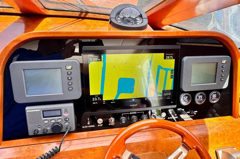 Slide: The Image of Helm of 2009 Grand Harbour 66 Motoryacht with navigation and control instruments. - 43