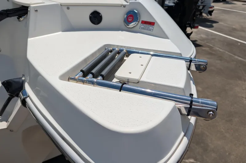 Slide: The Image of 2021 Stingray 204 LR boat swim platform with retractable ladder. - 12