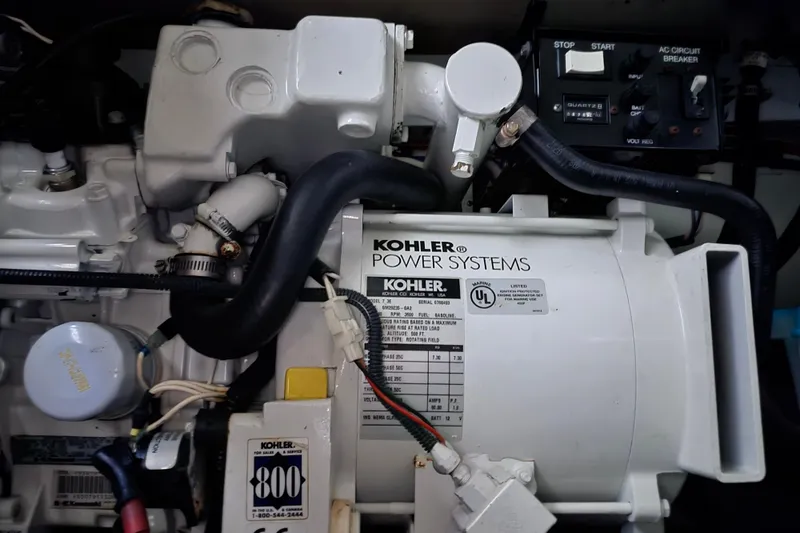 Slide: The Image of Kohler power system in a 2004 Formula 370 Super Sport boat engine compartment. - 17