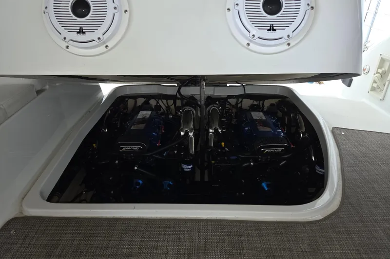 Slide: The Image of Engine compartment of a 2004 Formula 370 Super Sport boat with Mercury engines. - 26