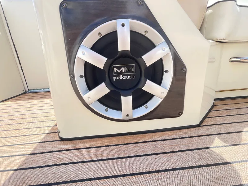 Slide: The Image of A Polk Audio speaker is integrated into the deck of a 2015 Harris FloteBote Crown DL 250. - 48