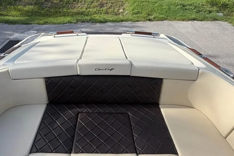 Slide: The Image of 2018 Chris-Craft Corsair 30 boat interior with elegant leather seating and quilted design. - 12