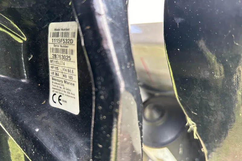 Slide: The Image of Close-up of Mercury Marine engine label on 2020 Triton 18 TX boat. - 18
