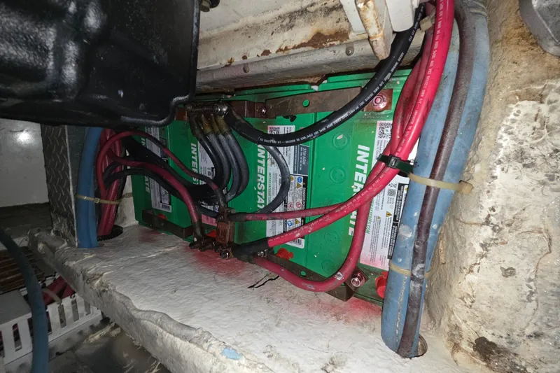 Slide: The Image of Battery compartment of a 2002 Ocean 56 Super Sport boat with Interstate batteries. - 38