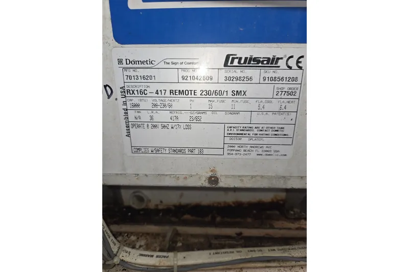 Slide: The Image of Label on a Dometic Cruisair RX16C-417 Remote unit, showing specifications and safety standards. - 42