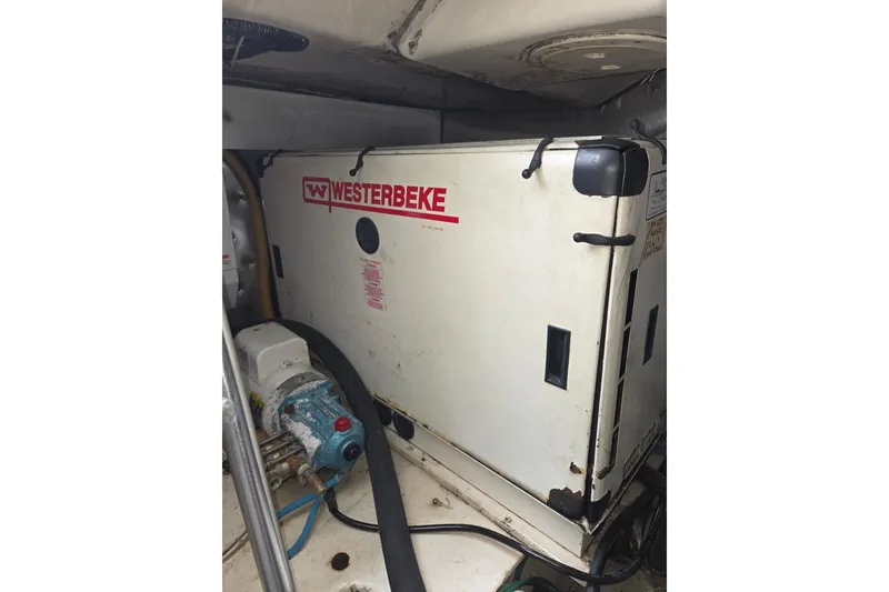 Slide: The Image of Westerbeke generator in 2002 Ocean 56 Super Sport yacht engine room. - 40