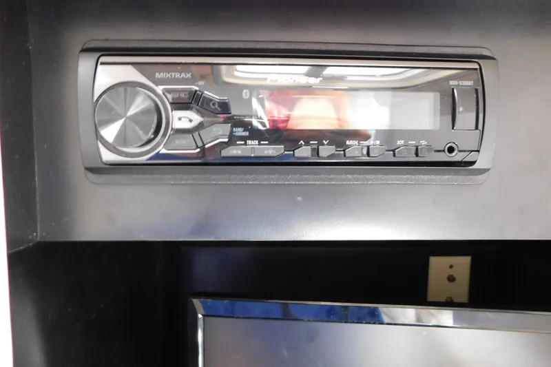 Slide: The Image of Stereo system in a 1993 Silverton 34 Express boat interior. - 34