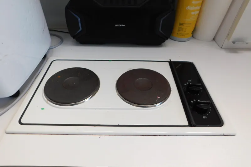 Slide: The Image of Electric stove with dual burners on a Silverton 34 Express, 1993 model. - 42