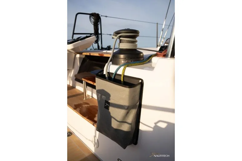 Slide: The Image of The Nautitech 48 Open features a winch with neatly stored ropes on deck. - 14