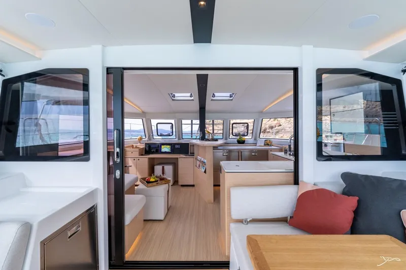 Slide: The Image of The image shows the interior of a 2027 Nautitech 44 Open with modern design and large windows. - 37