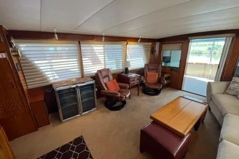 Slide: The Image of 1978 Hatteras 58 Motor Yacht interior with cozy seating and large windows. - 41