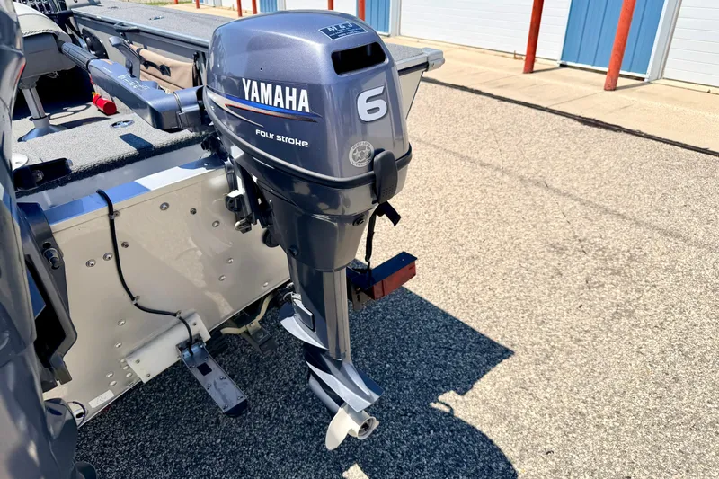 Slide: The Image of 2005 Alumacraft Tournament Sport 175 with Yamaha 6HP four-stroke outboard motor. - 20