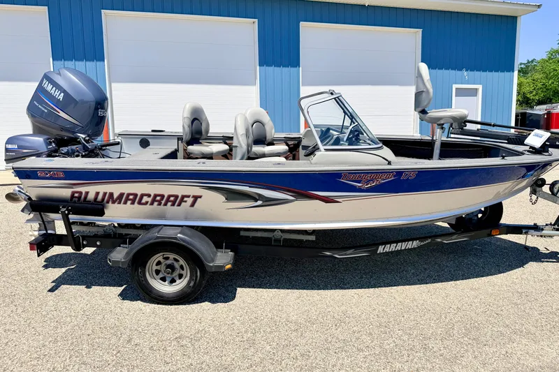 Slide: The Image of 2005 Alumacraft Tournament Sport 175 boat with Yamaha motor on trailer. - 4