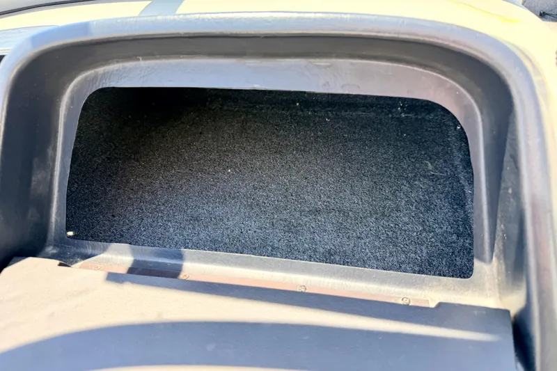 Slide: The Image of Storage compartment in a 2005 Alumacraft Tournament Sport 175 boat. - 40