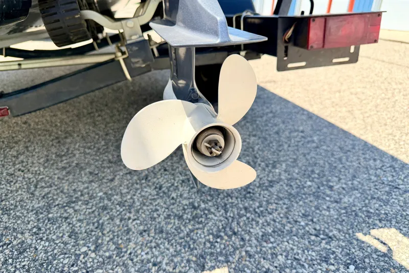 Slide: The Image of Propeller of a 2005 Alumacraft Tournament Sport 175 boat on a trailer. - 22