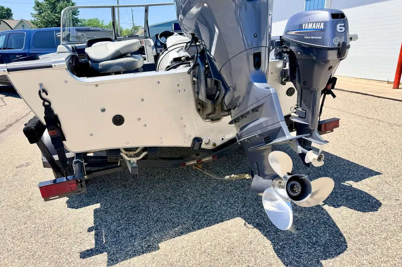 Slide: The Image of 2005 Alumacraft Tournament Sport 175 boat with Yamaha outboard motor on trailer. - 24