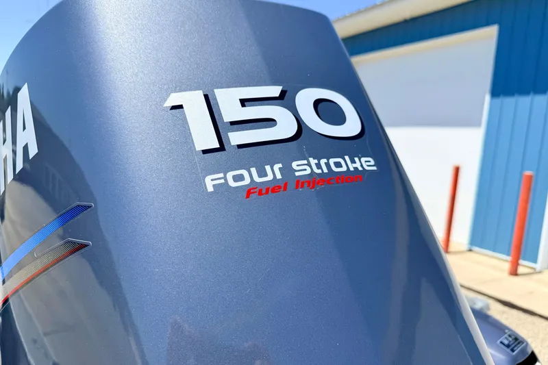 Slide: The Image of Yamaha 150 four-stroke outboard engine with fuel injection on 2005 Alumacraft Tournament Sport 175. - 18