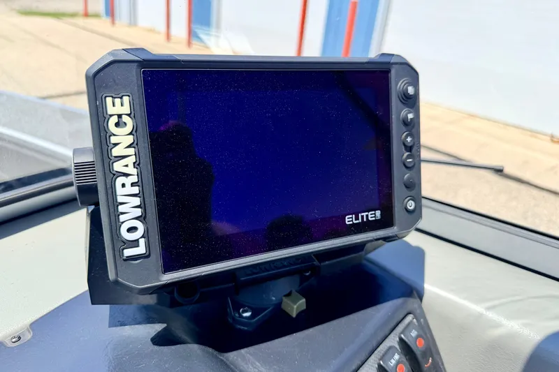 Slide: The Image of Lowrance Elite fish finder on 2005 Alumacraft Tournament Sport 175 boat dashboard. - 52