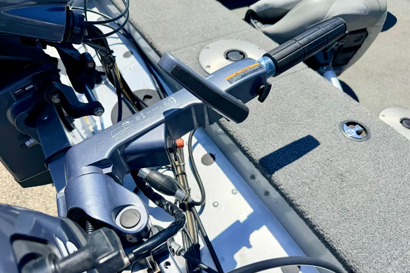 Slide: The Image of Close-up of 2005 Alumacraft Tournament Sport 175 boat's steering mechanism. - 23