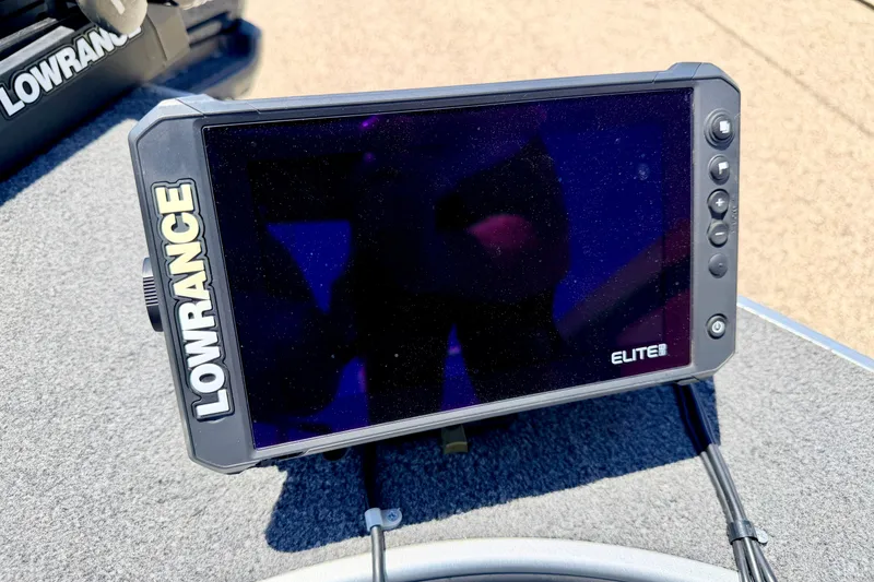 Slide: The Image of Lowrance Elite fish finder on 2005 Alumacraft Tournament Sport 175 boat dashboard. - 68