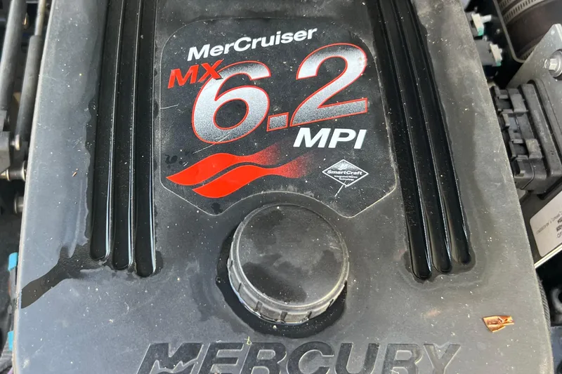 Slide: The Image of MerCruiser MX 6.2 MPI engine on a 2004 Bennington 2875RLX boat. - 16
