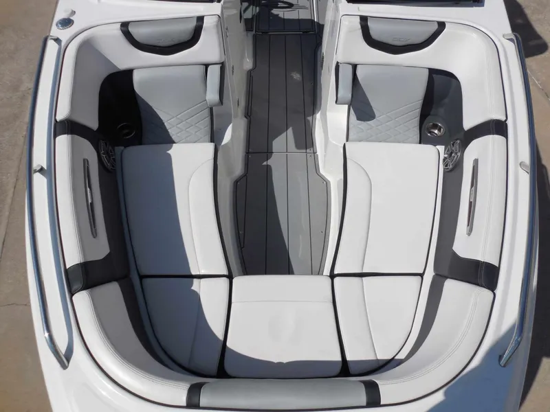 Slide: The Image of Interior view of a 2020 Chaparral 277 SSX with sleek white and gray upholstery. - 23