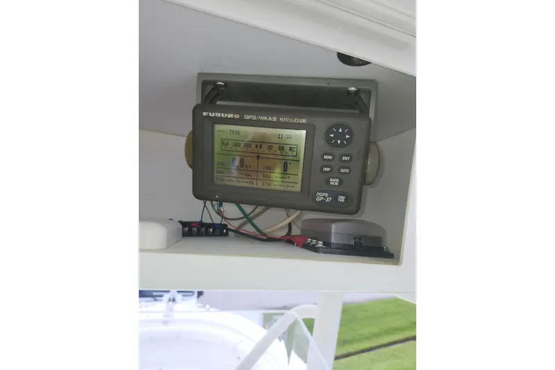 Slide: The Image of Furuno GPS navigator installed on a 2007 Edgewater 228CC boat dashboard. - 16