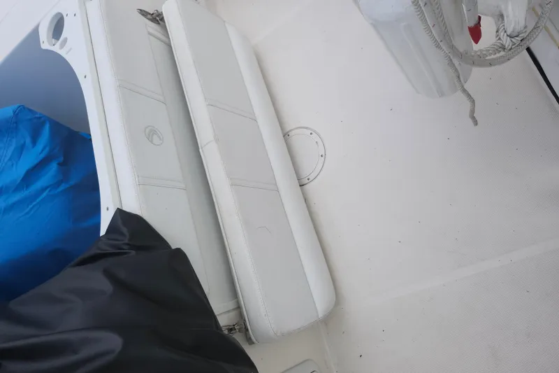 Slide: The Image of White seating area on a 2007 Edgewater 228CC boat deck. - 30