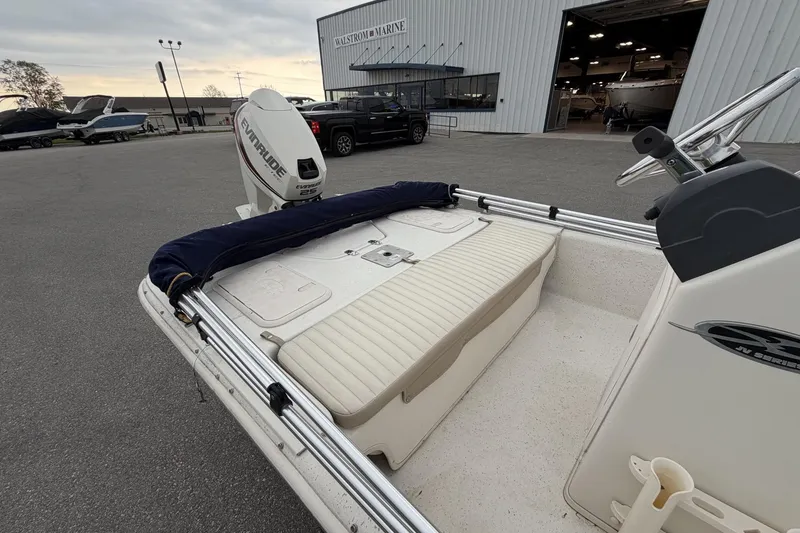 Slide: The Image of 2014 Carolina Skiff JV15CC boat with Evinrude engine at Walstrom Marine dealership. - 12