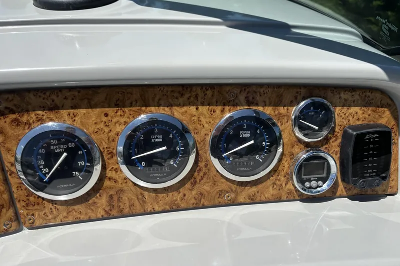 Slide: The Image of Dashboard of a 2007 Formula 280 Bowrider boat with speed and RPM gauges. - 15