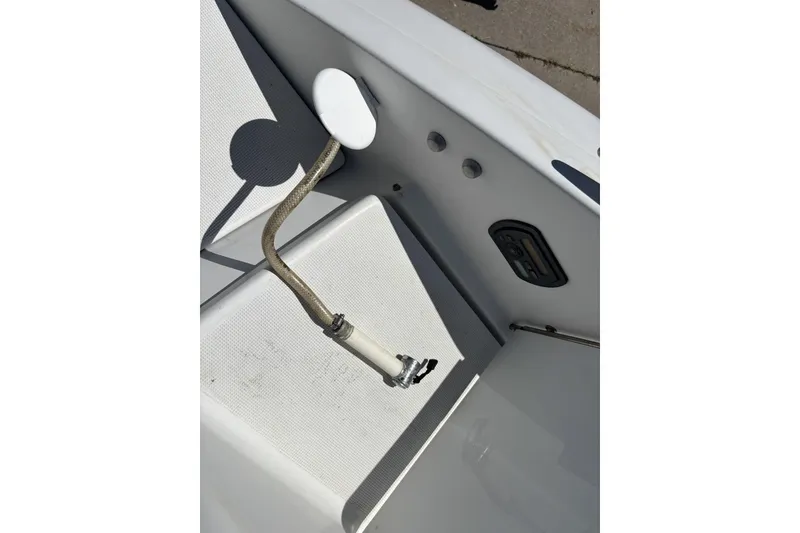 Slide: The Image of 2007 Formula 280 Bowrider boat interior detail with hose and fittings. - 20