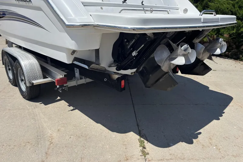 Slide: The Image of 2007 Formula 280 Bowrider on trailer, showcasing dual propellers and sleek design. - 6