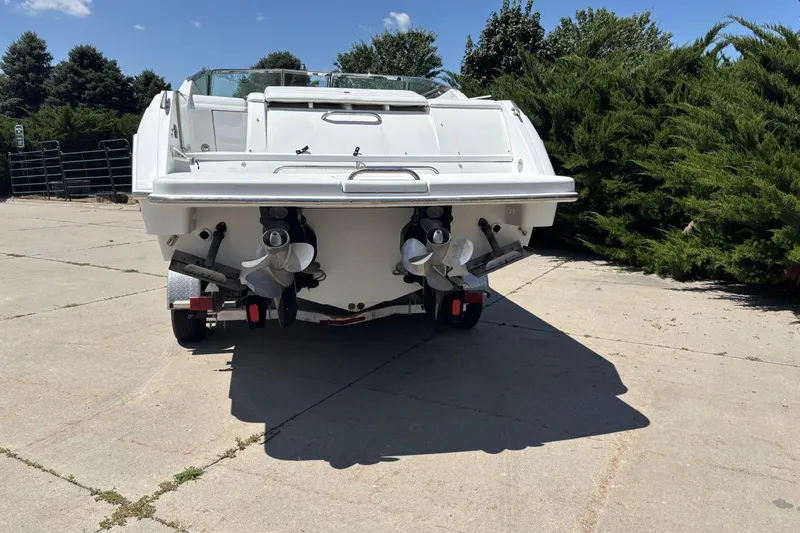 Slide: The Image of Rear view of a 2007 Formula 280 Bowrider boat on a trailer. - 2