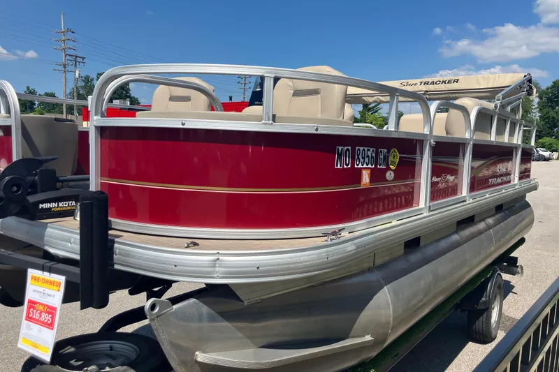 Slide: The Image of 2020 Sun Tracker Bass Buggy 18 DLX pontoon boat, red exterior, for sale at $16,895. - 3