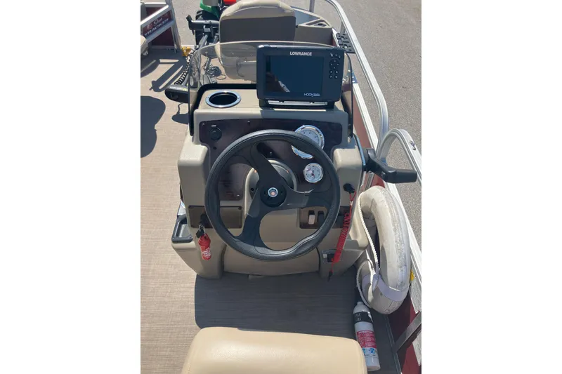 Slide: The Image of 2020 Sun Tracker Bass Buggy 18 DLX steering console with Lowrance fish finder. - 10