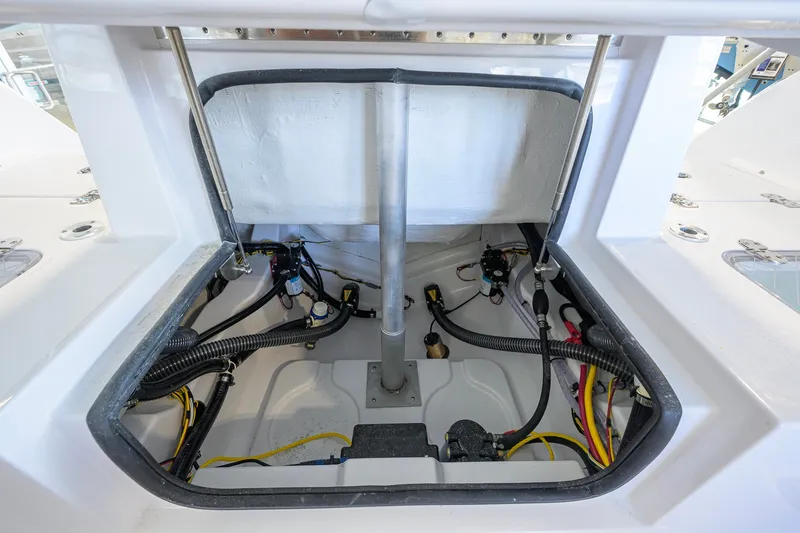 Slide: The Image of 2027 Sportsman Heritage 231 Center Console boat interior wiring and components. - 38