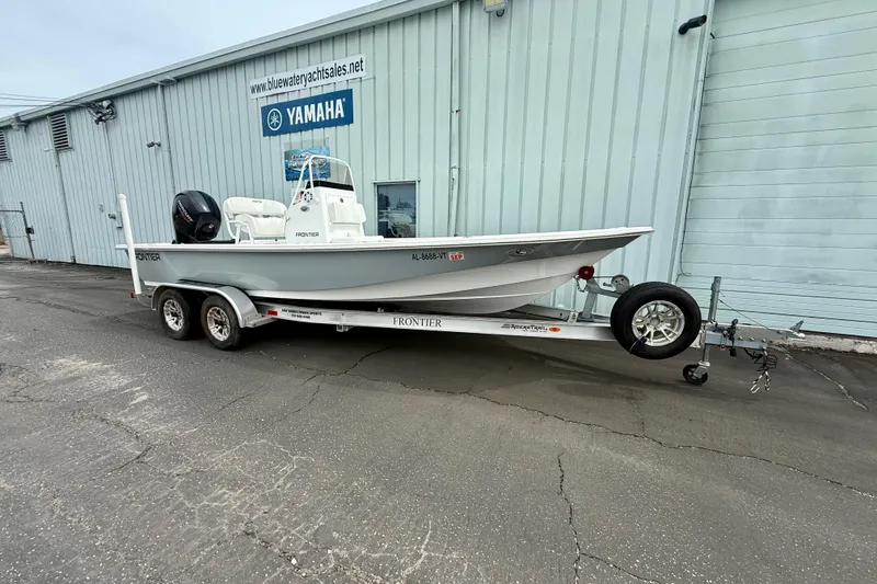 The Image of 2023 Frontier 2104 boat on trailer, parked outside Bluewater Yacht Sales building. - 0