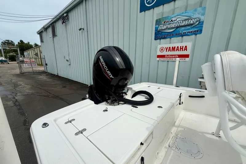 Slide: The Image of Boat with Mercury outboard motor at Yamaha service center, Frontier 2104 model, 2023. - 7