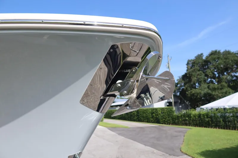 Slide: The Image of 2025 Sea Hunt Gamefish 28 Coffin Box boat anchor detail under clear blue sky. - 6