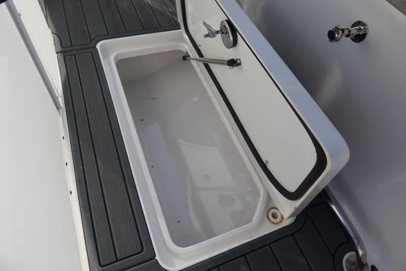 Slide: The Image of Open storage compartment on 2025 Sea Hunt Gamefish 28 Coffin Box boat. - 34